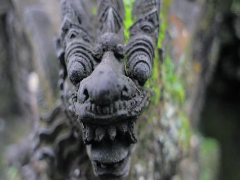 statue of a dragon in ubud bali temple