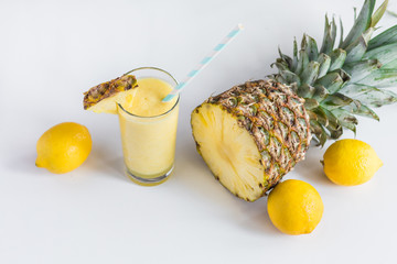 pineapple cocktail, pinapple and lemons from the top