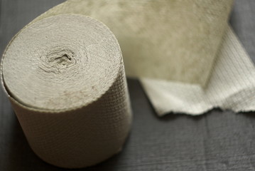 toilet paper roll on dark background 