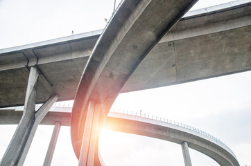 Naklejka premium Elevated expressway . The curve of suspension bridge Large elevated traffic highway in Bangkok, Thailand.