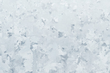 Winter frosty patterns on the frozen ice window