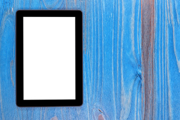 A black tablet template with a blank screen on wood