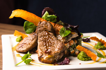 Pork with carrots and sugar peas