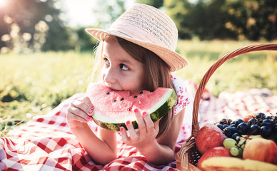 Picnic time. Little girl enjoying in picnic. Nature, lifestyle