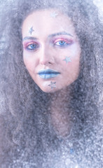 Winter portrait attractive girl in bright makeup