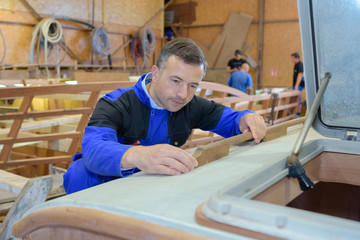 Fototapeta na wymiar image of mature carpenter in the workshop