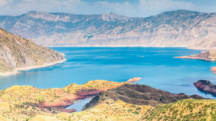 Nice view of Nurek Reservoir in Tajikistan - obrazy, fototapety, plakaty