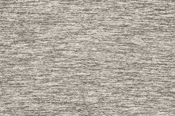 small interweaving of machine knitting on a knitted cloth of gray color.