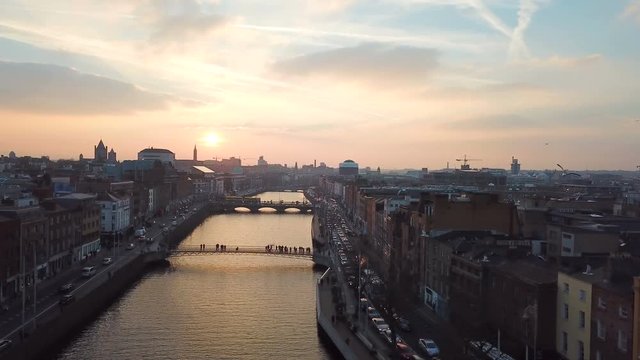 aerial view of city center of Dublin with river Liffey during sunset