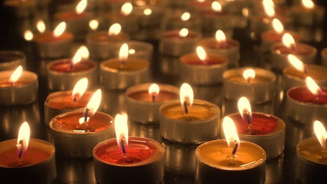 Candlelight - Many burning candles close-up