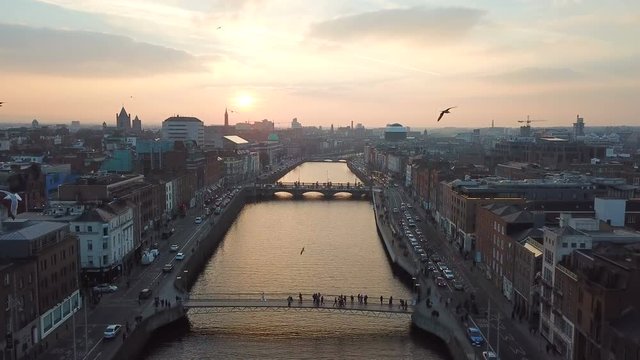 aerial view of city center of Dublin with river Liffey during sunset