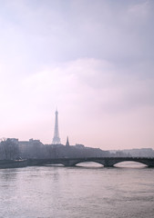 View of Seine River and Eiffel Tower at Sunset in Paris France