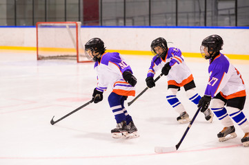 Kids ice hockey.