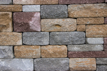 stone wall with three different colors