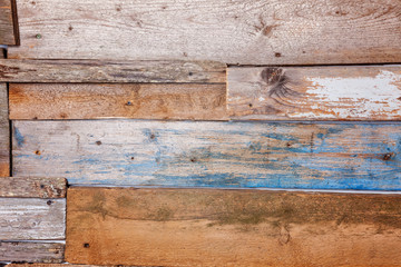 Simple eco wooden desk texture. Close up of wall made of brown and blue wooden planks