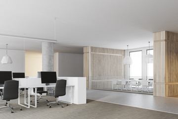 Computers in an open space office environment side