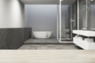 Fototapeta na wymiar Interior of a gray bathroom with marble floor blur