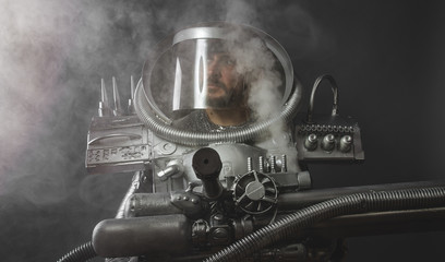 astronaut, space man's costume made with cardboard and pieces of recycling, imagination and...