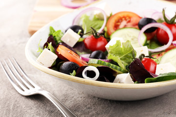 Salad with cheese and fresh vegetables and olives. Greek salad.