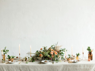 Festive table decorated with flowers