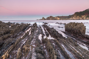 the beach of Gueirua, a disturbing landscape of sharp rocks that emerge from the ocean, pretends to be from another world, with an impressive beauty at dawn, dusk and in the starry night © AGUS