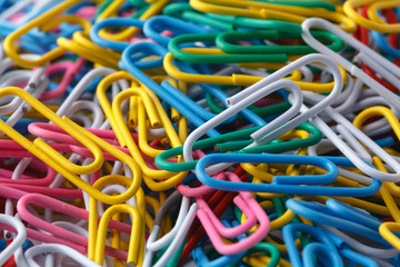pile of colored office paper clips
