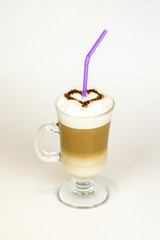 latte in high glass with foam on white background
