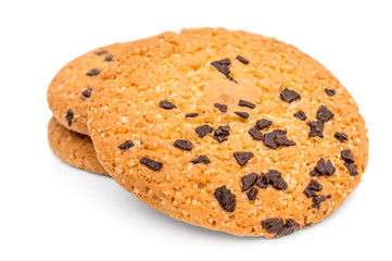 Pile of chocolate chip cookies on white background.