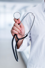 Doctor with stethoscope in hand