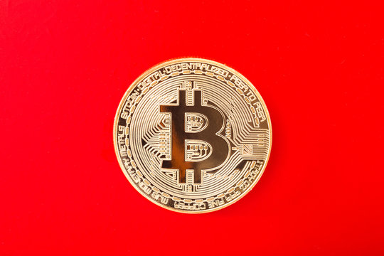 Bitcoin auf rotem Hintergrund