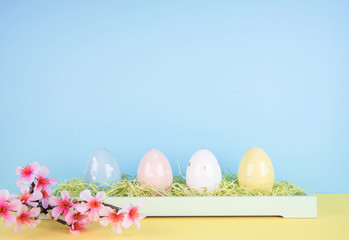 Creative easter composition with painted eggs.