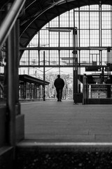 the lonely man on train station in Prague