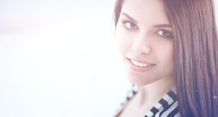 Beautiful young woman in shop