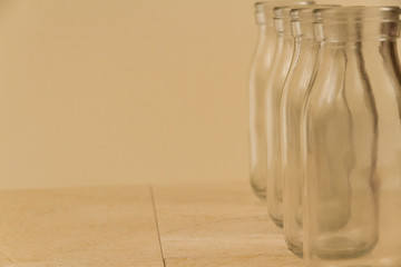 Four glass bottles to right, copyspace.