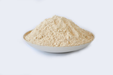 Wholemeal flour on white background