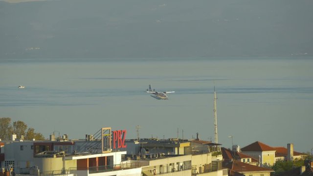Seaplane flying along the coast