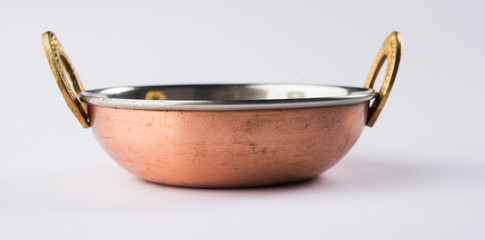 empty Indian Kadhai or Karhai or frying pan or iron wok isolated on white background
