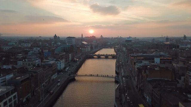 aerial view of city center of Dublin with river Liffey during sunset