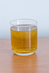 Caffeinated energy drink in glass.