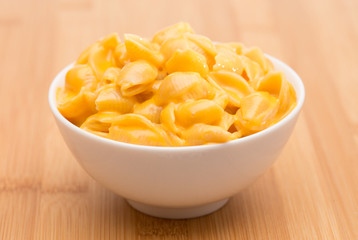 Macaroni Shells and Cheese on a Wooden Table