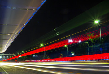 Fototapeta na wymiar Car lights trails in night city
