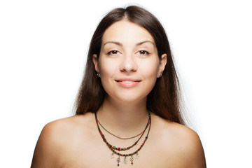 happy brunette girl wearing a necklace with generic symbols