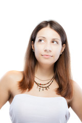 surprised brunette girl wearing a necklace with generic symbols