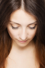 brunette girl looking down portrait