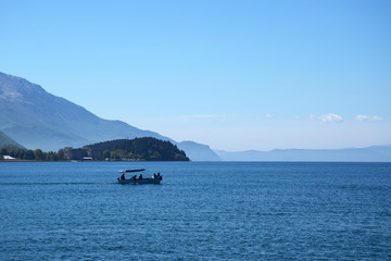 Boats moored in ohrid lake. Ohrid, Macedonia.