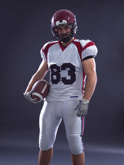 American Football Player isolated on gray