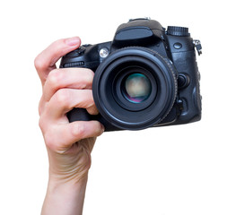 Female hand with modern DSLR camera with lens mounted. Photography equipment. Isolated on white.