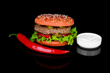 Spicy Burger on a black background