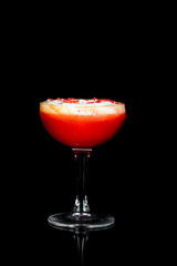 alcoholic drink with berries on a black background