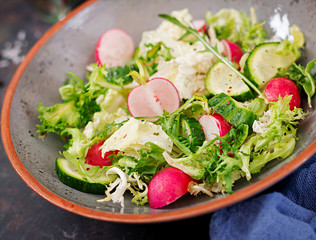 Mix salad from fresh vegetables and greens herbs. Dietary menu. Proper nutrition. Healthy lifestyle.